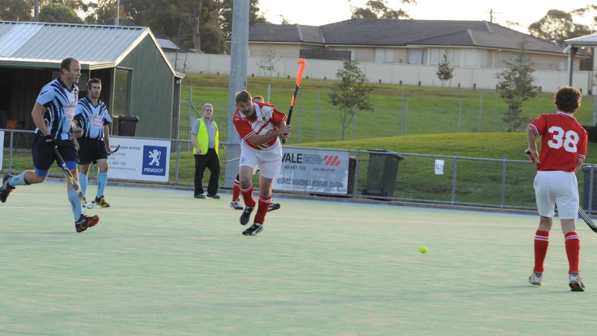 Graham McAndrew passes to a teammate during the Bowral versus Moss Vale game. Photo by Lauren Strode