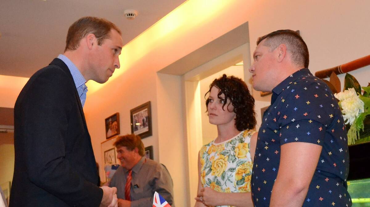 SOMBRE DISCUSSION: Prince William said he was close to tears while talking to Dubbo parents Rob and Amy McIntyre at Bear Cottage.