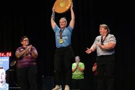 Maddison Kirley lifting her prize. Picture supplied. 