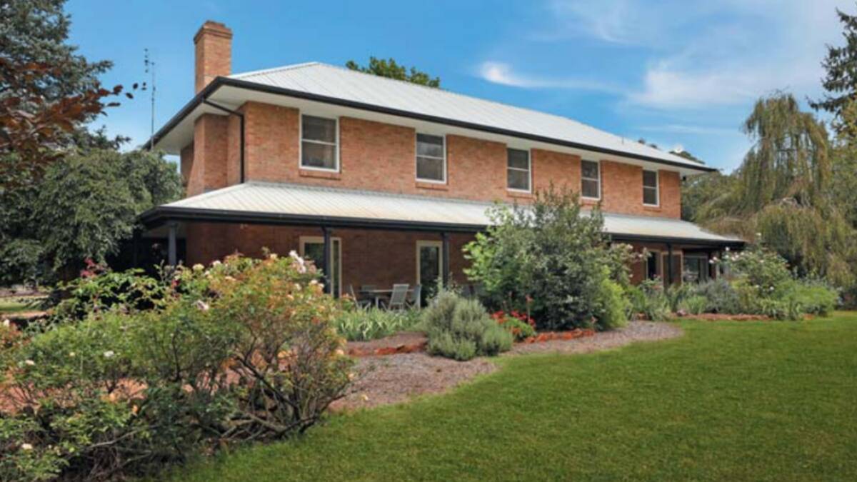 The two storey, five bedroom brick residence stands proudly in an established garden with trees and open lawn areas. Picture supplied