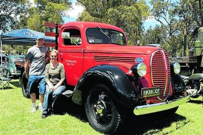 Stephen and Tanya Chalker-Holz with their 1938 Ford which was used as the Hill Top fire truck in the 1950s and 1960s. Photo by Roy Truscott