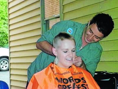 Jenna Bartlett gets her head shaved. Photo supplied