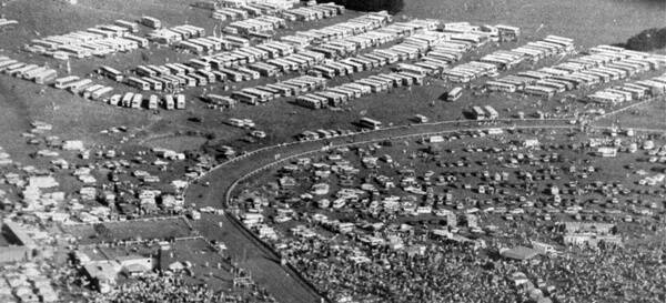 1981 CROWD: Aerial photo taken by Leonie Knapman shows the huge crowd and lots of buses at the Bong Bong races. Photos: BDH