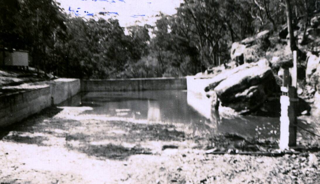 NEW BATHS: The old railway dam being prepared to open as Mittagong Baths in 1931. 
Photos: BDH&FHS