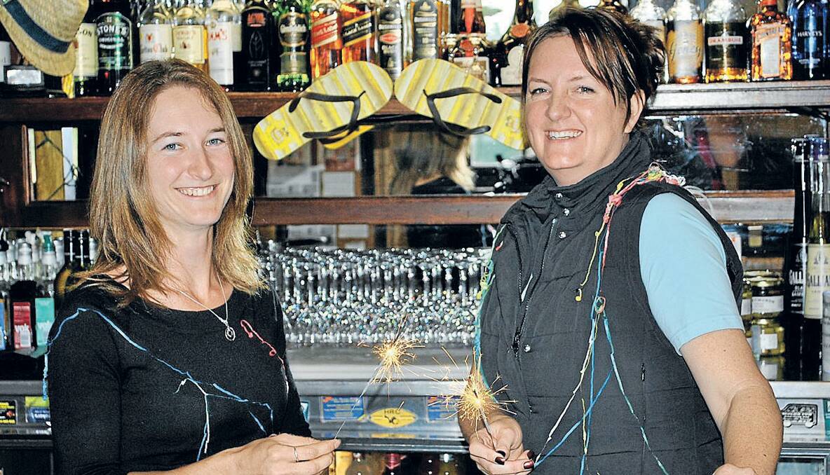 Sutton Forest Inn manager Kirsty Nielsen and Ali Hilliard are ready to celebrate New Year with the people of the Highlands.	Photo by Jackie Meyers 