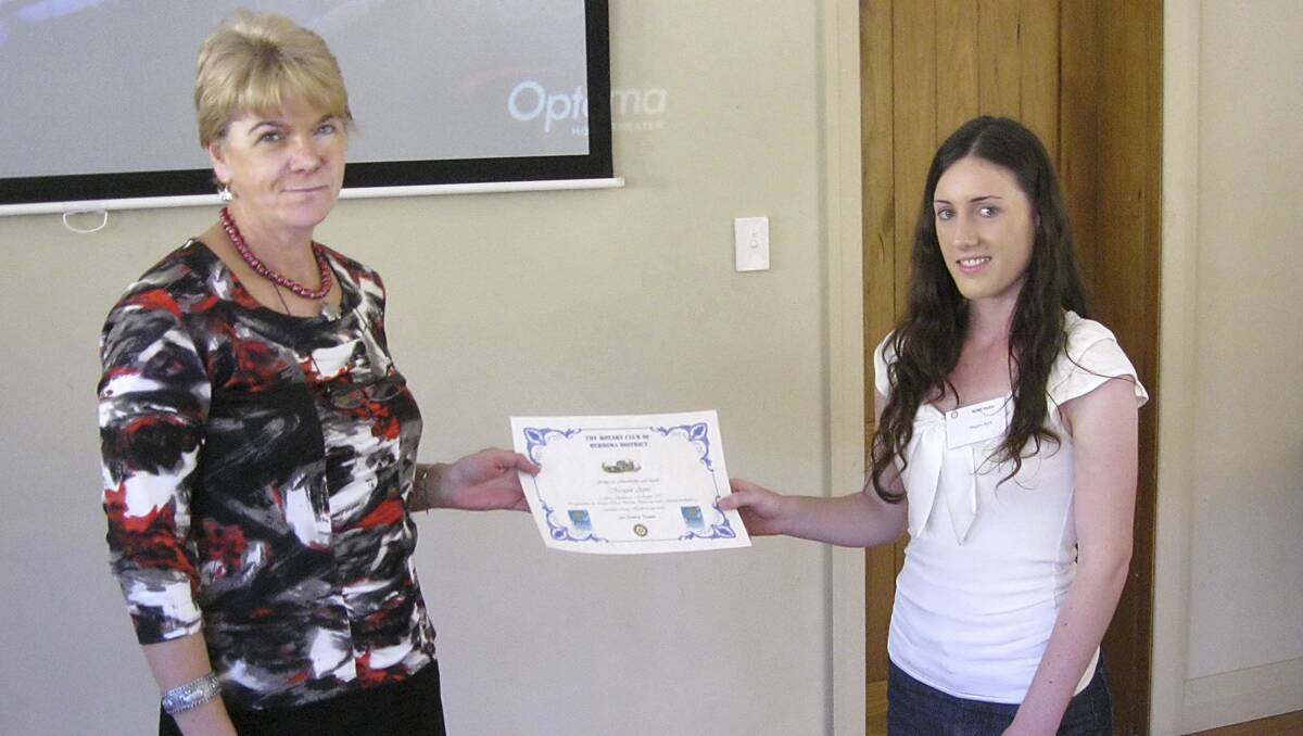 Tara.Ed Ambassador Megan Ayre being presented with her Certificate of Appreciation by local Rotarian Carol Smith. Image supplied