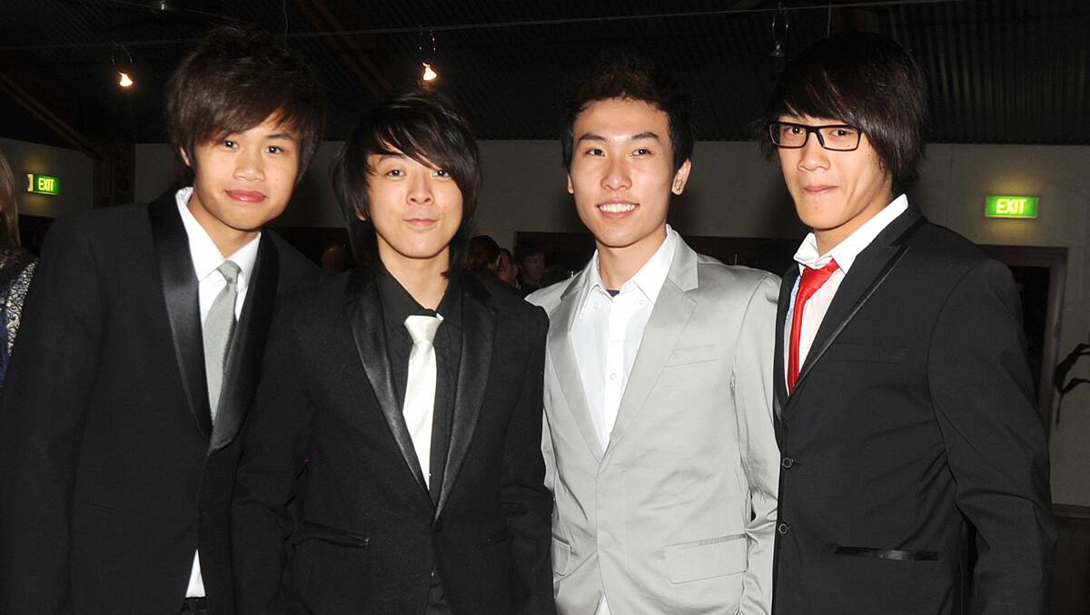 Haron Lan, Joseph Lam, Christopher Chan and Wynton Lee showing a variety of different dress styles. 