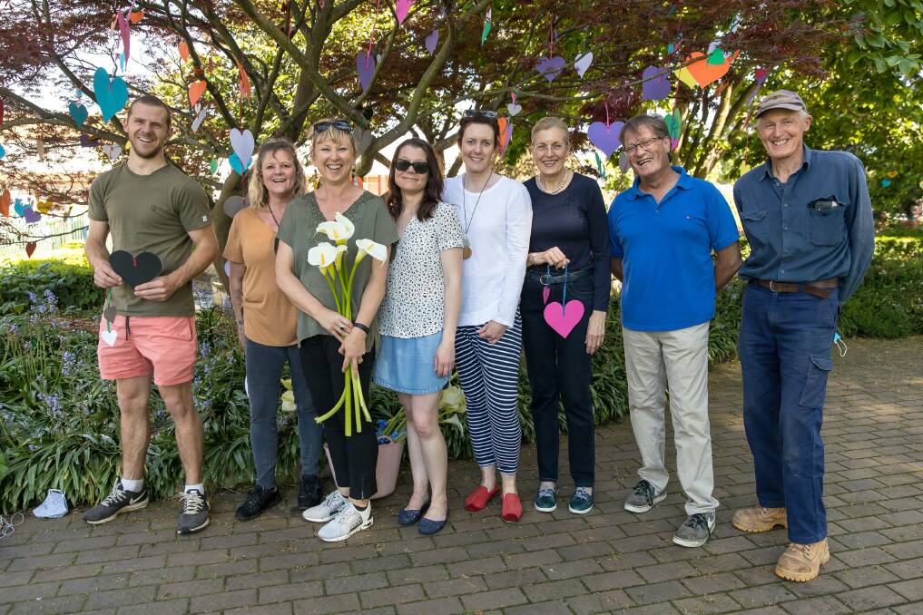 Southern Highlands Suicide Prevention Program members Chris Harker, Michelle Williams, Nicole Blaik, Alice Richards, Melinda Kalde, Val and Peter Van Dort hung the paper hearts over the weekend. Picture: Darryn McKay from McKay Photography 
