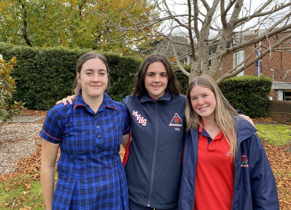 Georgie Hurford, Holly Hurford and Lucy Nash are all considering pursuing hockey once they finish school. Photo: Briannah Devlin. 