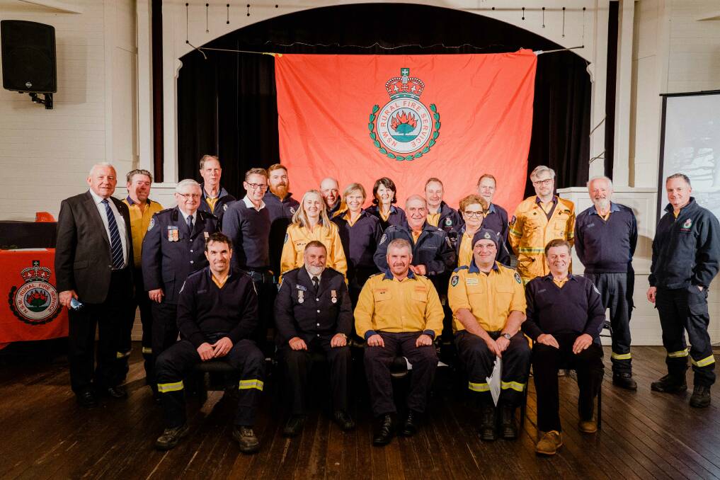 A group of RFS volunteers from the Burrawang Rural Fire Brigade gathered this week to receive National Emergency Medals for their efforts during the 2019/20 bushfires. Picture: Rob Macdonald