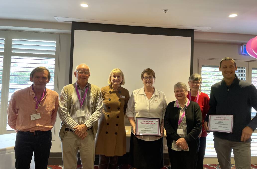 John Matthew, Brian Nowland, Parkinson's NSW representative Christine McGee, Jenny McClay and Robyn Milne stand proudly with local heroes Nicola Crisp and Matthew Ott, who hold their certificates. Picture: Briannah Devlin