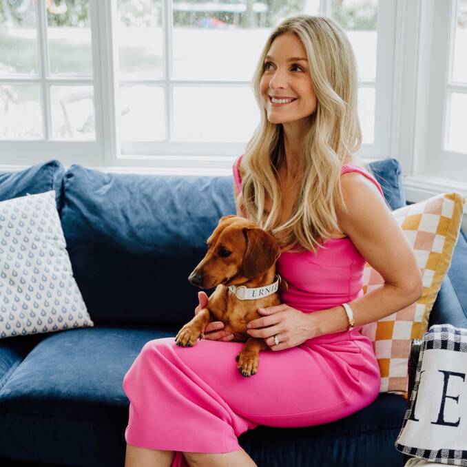 Pip Reed's newest addition to the family, Ernie the miniature dachshund is at the heart of her accessory business Saint Ernie. Picture supplied.