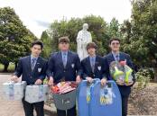 St Paul's International College vice captain Wai Man Chee, captains Ollie Johns and Jett Coom and vice captain Simon Sin have been encouraging students to donate Christmas presents for teenagers through their Kids Helping Kids appeal. Picture by Briannah Devlin