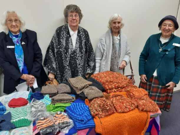 Knitting for Others gathered at the Mittaging Uniting Church with their newest creations. Photo: Supplied