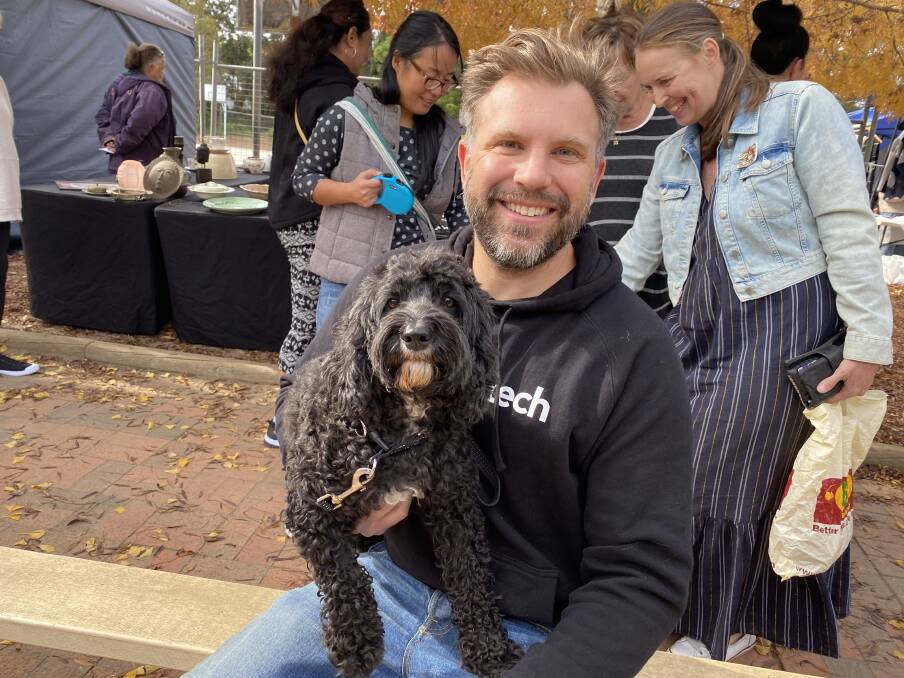 Mark Washborne came to the markets from Exeter with his spoodle Ronnie in tow. Photo: Briannah Devlin.