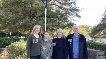 Meredith and Billy Rogers and Jeannine and Stuart Garrard wore family medals to the Anzac Day service in Exeter. Picture by Briannah Devlin