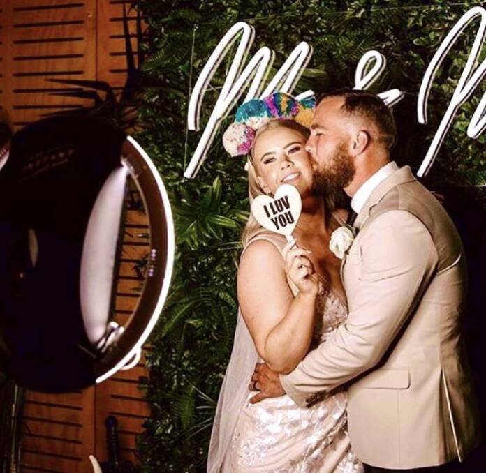 Fun and making the couples feel comfortable in front of the camera are at the heart of what Mr Wigley does. Photo: Supplied 