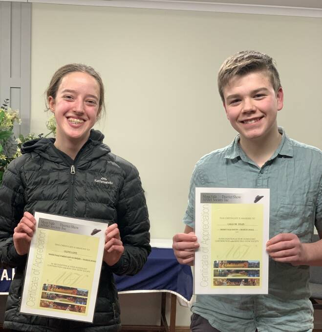 Junior volunteers Olive Love and Callum Dean were thanked for their hard work in the show's farmyard nursery. Picture: April Love 