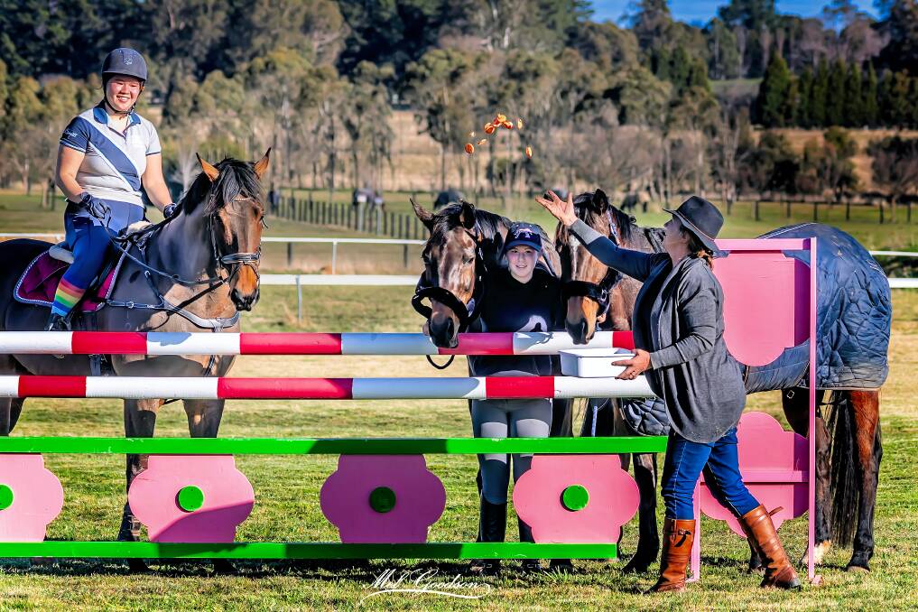 The SoHi Showjump Club gave their riding companions their favourite tasty treat - carrots for their birthdays. Photo: Melissa Goodson