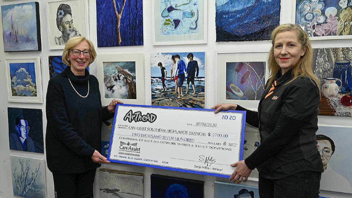 ArtHead owner and co-founder Sonja Millis presented Can Assist president Jenny Harper OAM last year with a $2700 cheque from fundraising efforts in 2020. Photo: John Swainston. 