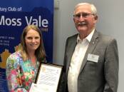 Moss Vale Public School principal Katherine Hurst receives a $14,000 cheque from the Rotary Club of Moss Vale President Malcolm Webber, which was raised through the annual Charity Golf Day. Picture supplied 