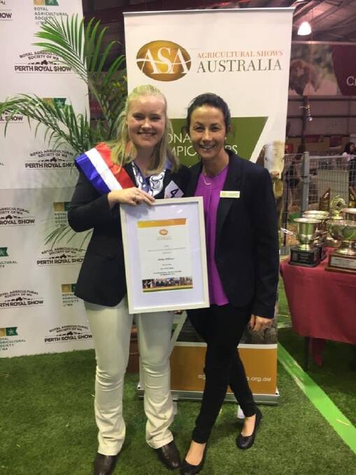 Rubey stood with Katie Stanley from ASC NSW after she was named Australia's first National Alpaca Young Judge winner in the Agriculture Shows Australia (ASA) National Young Judges and Paraders Championships. Picture: Supplied 