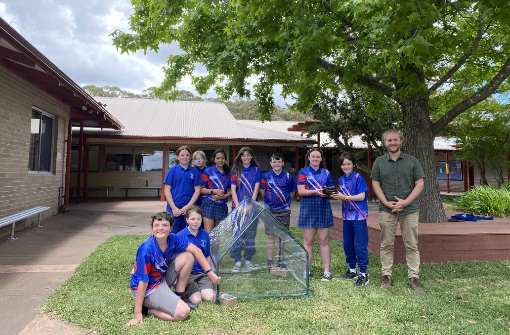 Charlotte, Taylah, Delta, Hayden, Tyler, Ray, school Captain Levi and teacher Granton Lee (left to right at the back) and Kevin and Finn (front) will keep an eye on the space seeds and compare their progress to wattle seeds that stayed on Earth. Picture: Briannah Devlin 