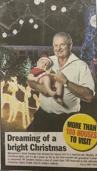Steve Sanders and his grandson on a previous Illawarra Mercury frontpage. Picture supplied
