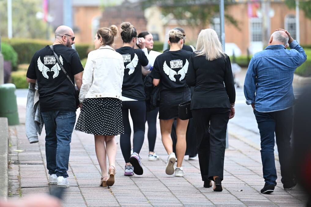 Relatives of one of the Buxton car crash victims leaving Campbelltown District Court on November 21. Picture by Dean Lewins/AAP