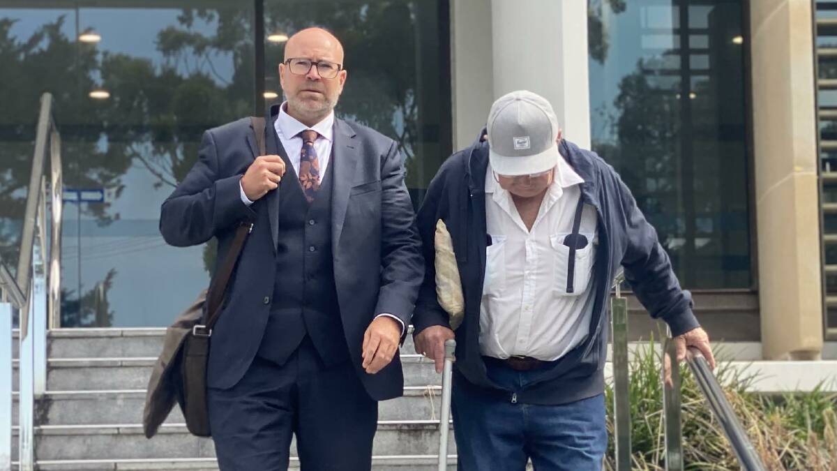 Kenneth MacDonald leaving Wollongong courthouse on the first day of his trial alongside lawyer Patrick Schmidt. Picture by Grace Crivellaro