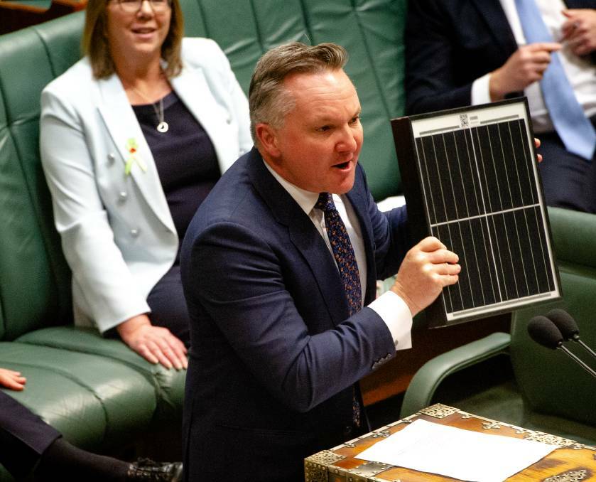 Labor MP Chris Bowen brandishes a solar panel in the House of Representatives in 2021. He believes climate change will be front and centre for electorates like Hume. Picture: Elesa Kurtz 