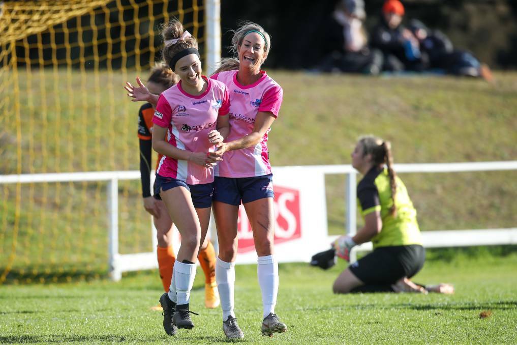 Chloe Middleton (left) celebrates scoring a goal for the Illawarra Stingrays. Picture: Adam McLean