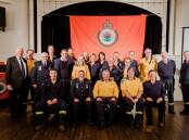 A group of RFS volunteers from the Burrawang Rural Fire Brigade gathered this week to receive National Emergency Medals for their efforts during the 2019/20 bushfires. Picture: Rob Macdonald