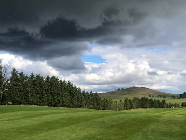 Heavy clouds over the Par 5, 17th hole at Moss vale Golf Club. Picture: supplied
