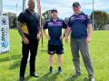 L to R: Group 7's Ashton Sims with Southern Highlands Storm coach Trevor Schodel and President Peter Howard. Photo: file
