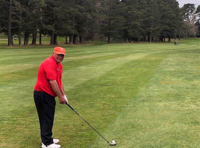 Member John Keane preparing his setup for his approach shot into the Par 5, 7th hole on Saturday. Photo: supplied
