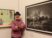 Mark Kelly of Mittagong, winner of the (open section) Goulburn Art Award for 2018 with his photographic print, Ghosts of the past. It was one of the last awards open to the public before COVID-19. Photo: Ainsleigh Sheridan