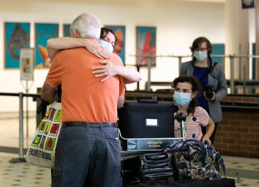 A family is reunited at Brisbane Airport. Image: Brisbane Airport