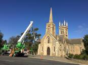 MAMMOTH TASK: Work gets underway at St Andrews Uniting Church.