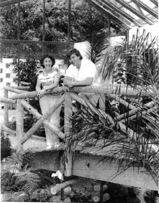 Ernst Weiher, a curator from Melbourne Zoo, helped Joyce Yeates to set up the Mittagong Butterfly house. Photo: Supplied (Southern Highland News 1987).