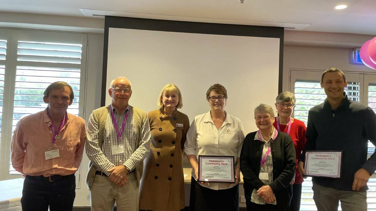 John Matthew, Brian Nowland, Parkinson's NSW representative Christine McGee, Jenny McClay and Robyn Milne stand proudly with local heroes Nicola Crisp and Matthew Ott, who hold their certificates. Picture: Briannah Devlin. 