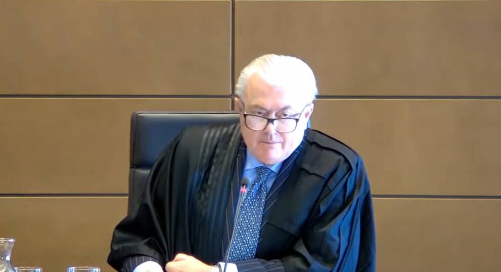 Justice Lee reading his judgment. Picture screenshot
