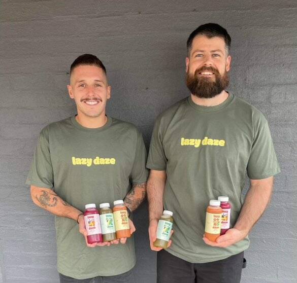 Jack Alexander (left) and Taylor Hudson (right), 'Lazy Daze' founders with their new juices. Picture supplied.