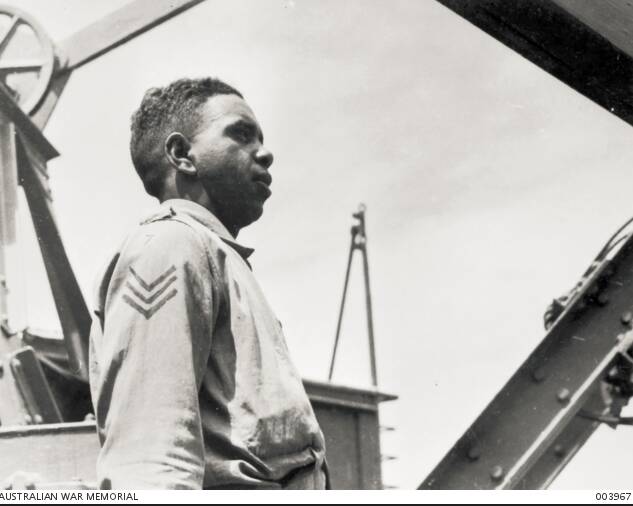 Sergeant Reginald Saunders, somewhere at sea. c. September 1941. Picture by Australian War Memorial.