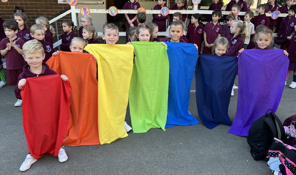 St Thomas Aquinas Bowral Kindergarten students made a fabric rainbow for Harmony Day. Picture by Sally Foy