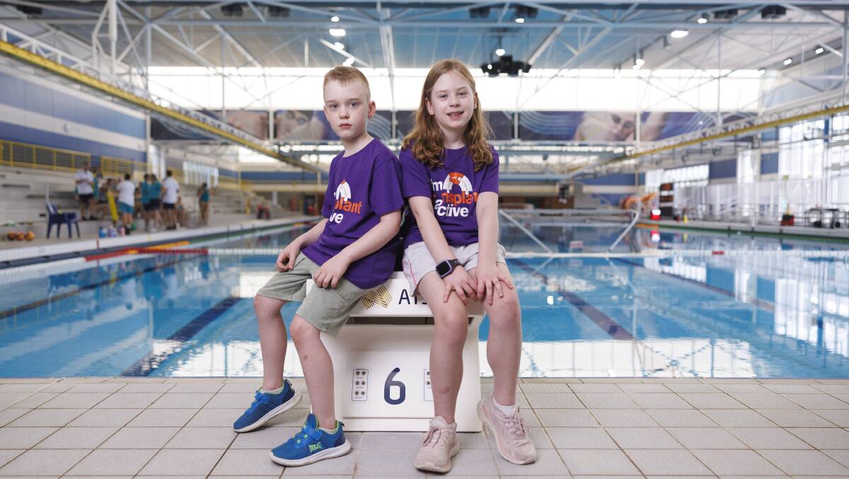 Nine-year-old Ariana Ford and her younger brother Sullivan Ford, age 7, will compete in swimming at the upcoming Transplant Games held at the AIS. Picture by Keegan Carroll