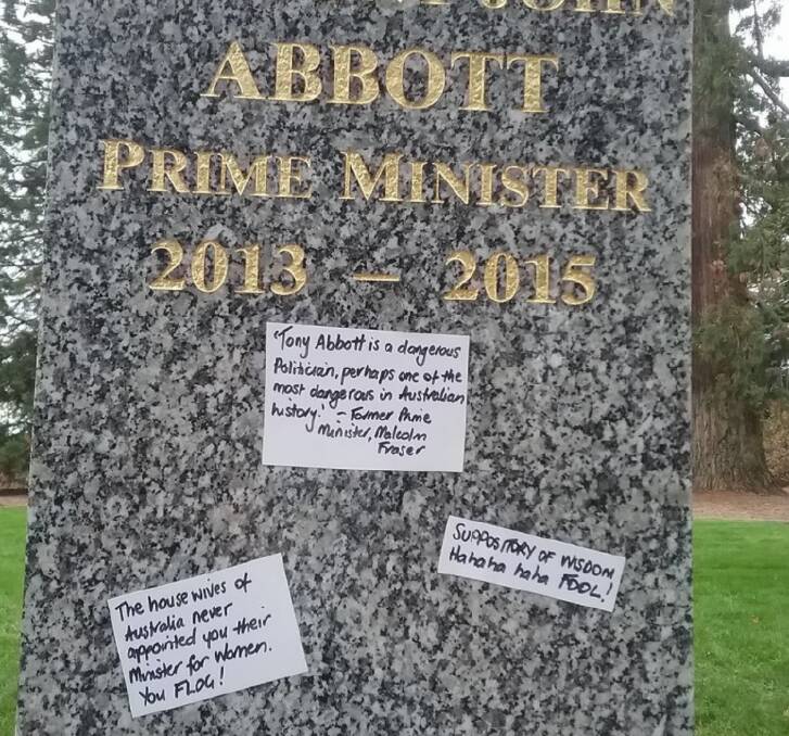 HARSH WORDS: Someone has left negative notes about former Prime Minister Tony Abbot on his recently unveiled bust.