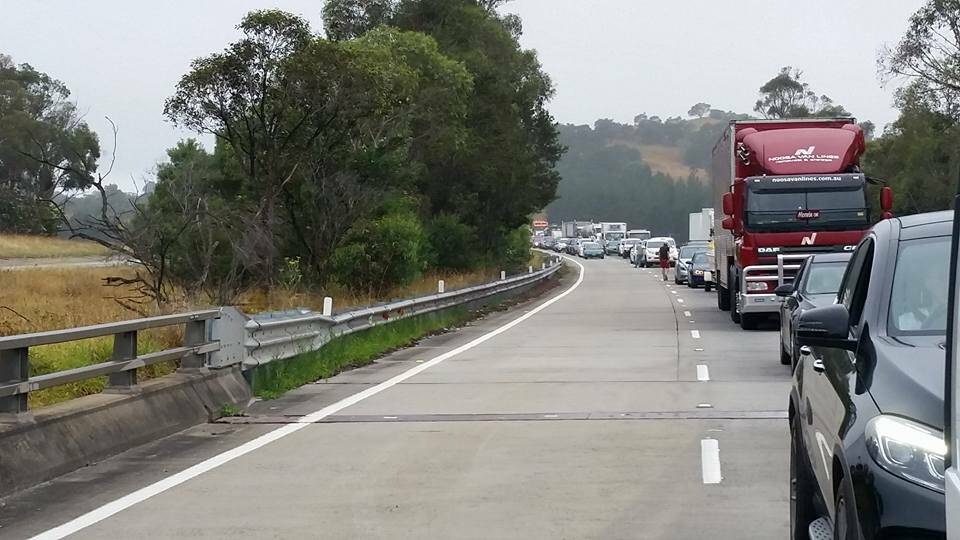 BANKED UP: Traffic was at a standstill as emergency services attended to the crash. Picture: Facebook. 