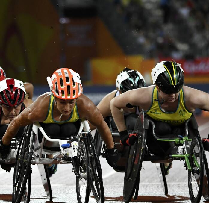 STEAMING AHEAD: Eliza Ault-Connell (left) and Angela Ballard  during the Women's T54 1500m Final. Picture: AAP Dean Lewins