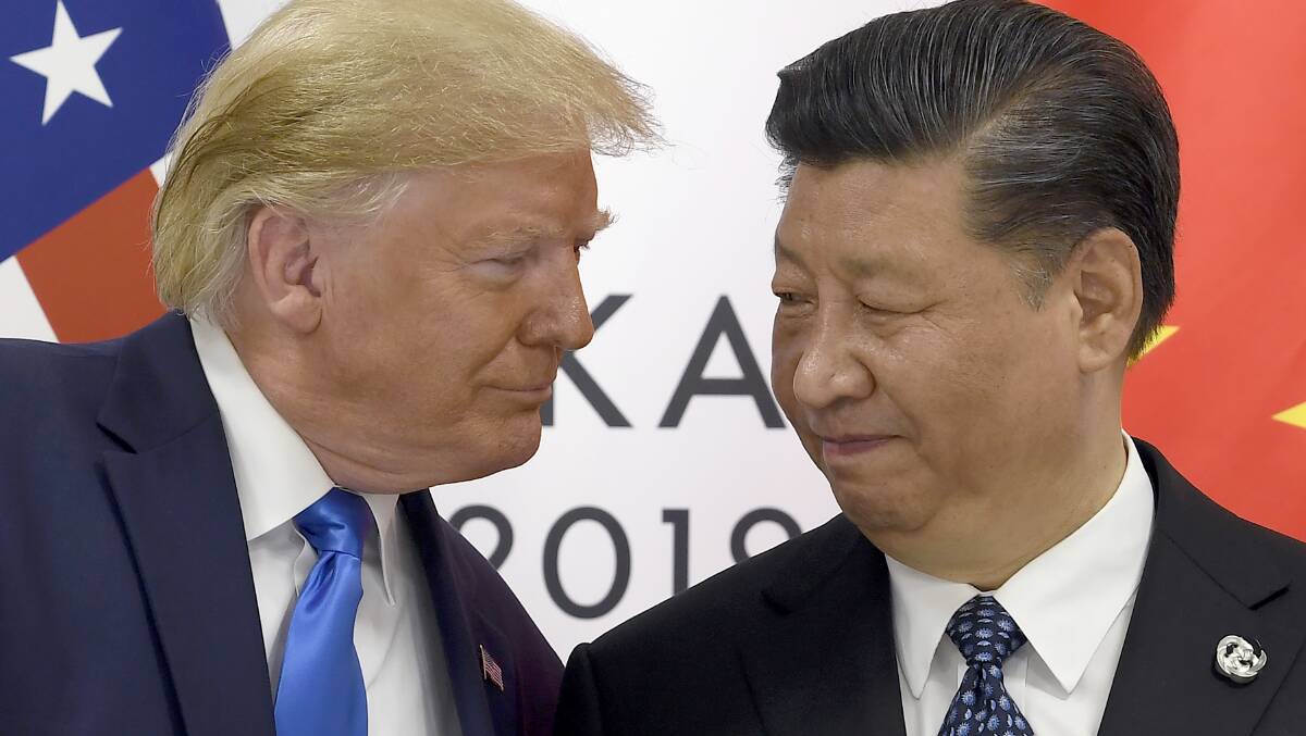 Former US president Donald Trump and Chinese President Xi Jinping. Picture AAP